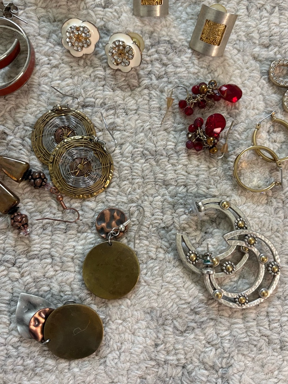 32 Full Pairs of 80’s Style Earrings Some signed Ralph Lauren and original pack.